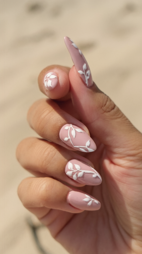 Explore Top Spring Summer Nails Ideas 2025: Pink Florals and Bunny Themes.