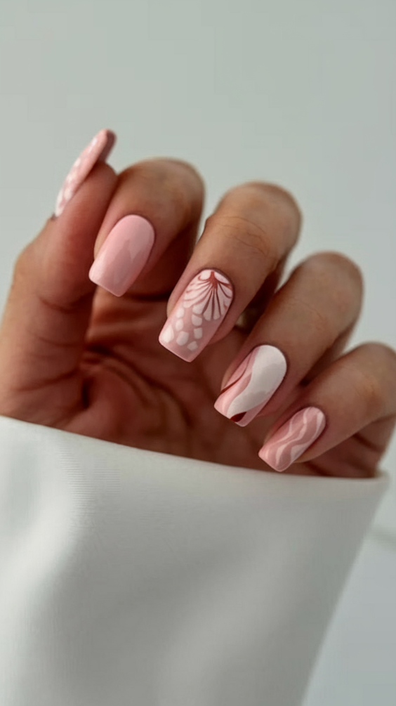 Explore Top Spring Summer Nails Ideas 2025: Pink Florals and Bunny Themes.