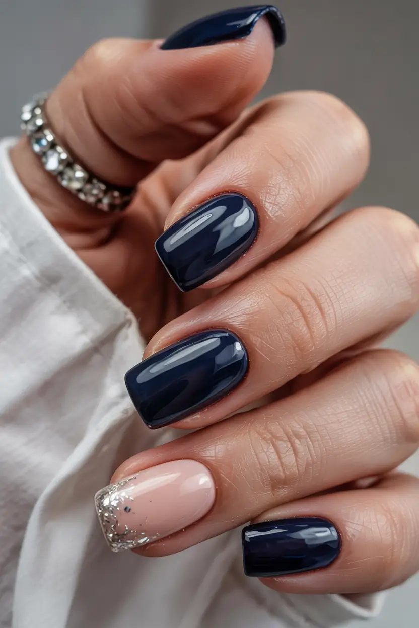 blue winter nails 2025 2026 navy meets nude glam