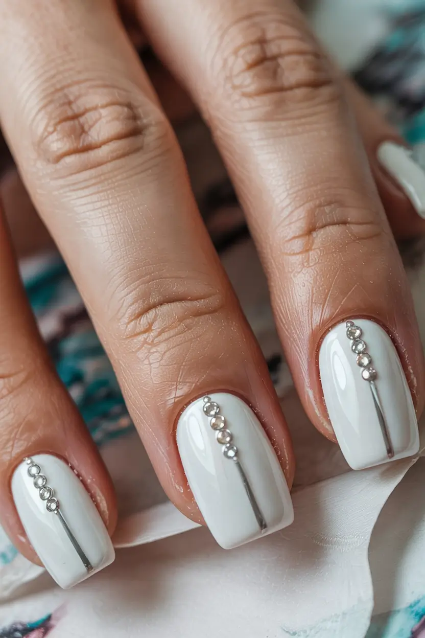 classy winter nails minimalist white with silver beads