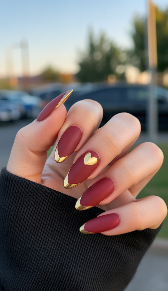 almond nail designs 2026 Red Almond Nails with Gold Detail