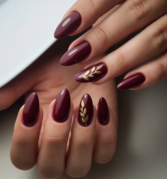 brown nails design Glossy Wine Brown With Subtle Gold Leaf Details