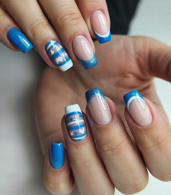 French nail designs 2026 Blue French tips with graphic patterns