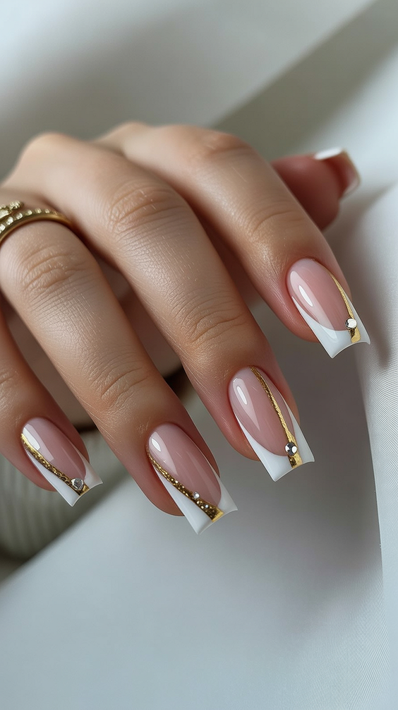 French nail designs 2026 Classic white French with gold accents