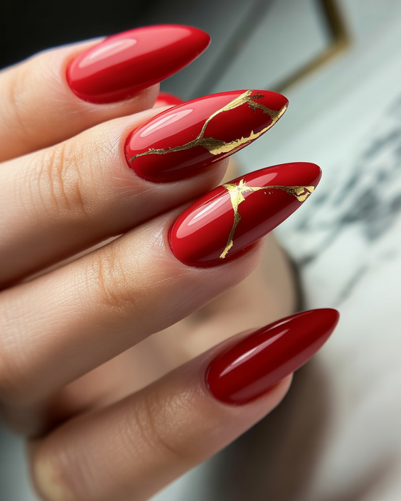 red nails design glossy gold accents