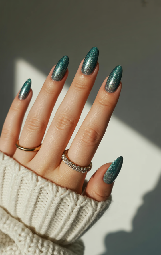 simple nails trend 2026 Metallic Green Almond Nails with Soft Shimmer