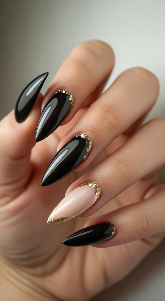 trendy birthday nails 2026 Glossy Black And Nude Almond Nails With Gold Outlines