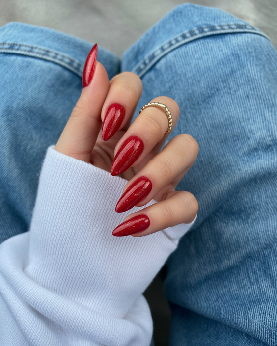 trendy cat eye nails 2026 Classic Red Cat Eye Nails With a Subtle Sparkle