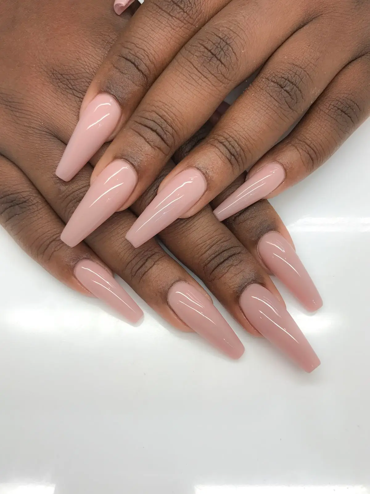 cute spring nail colors 2026 Milky Nude Coffin for the Ultimate Soft Neutral Reset