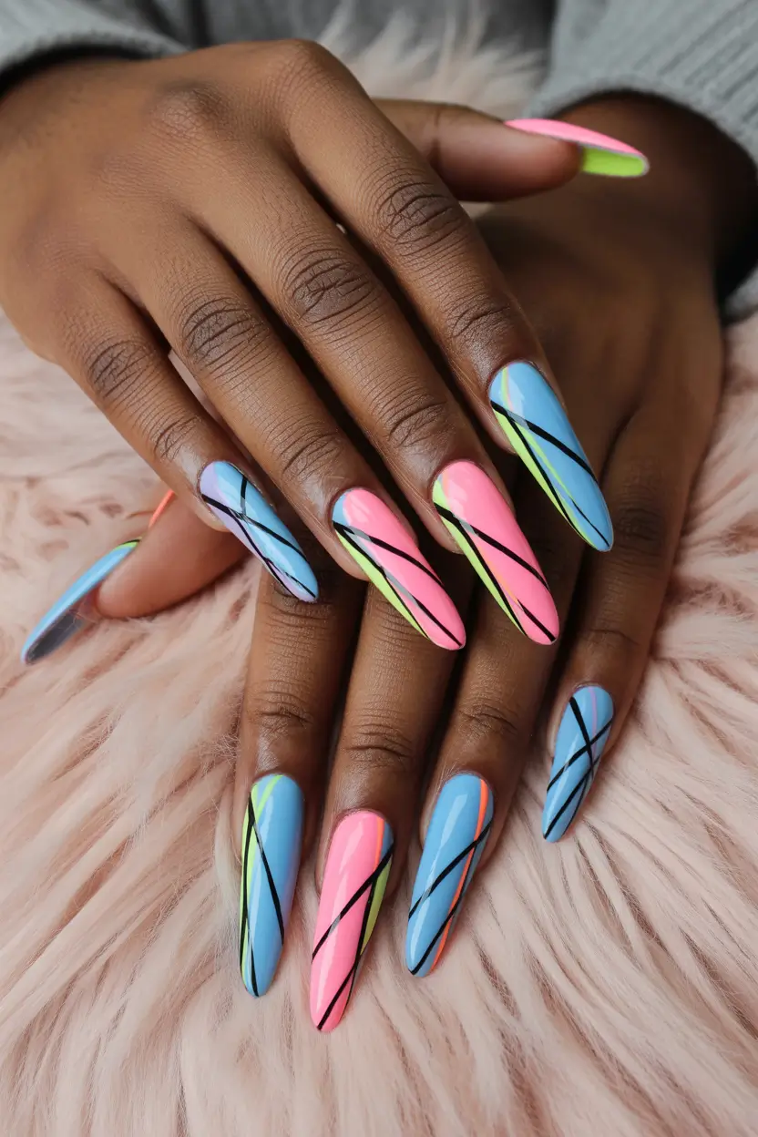 bright spring nails 2026 graphic blue and neon linework statement