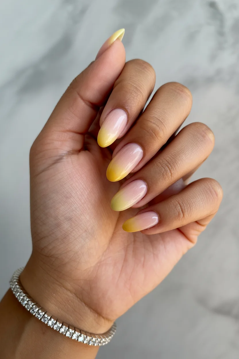 best spring aura nails 2026 Soft Lemon Aura Fade on Almond 13