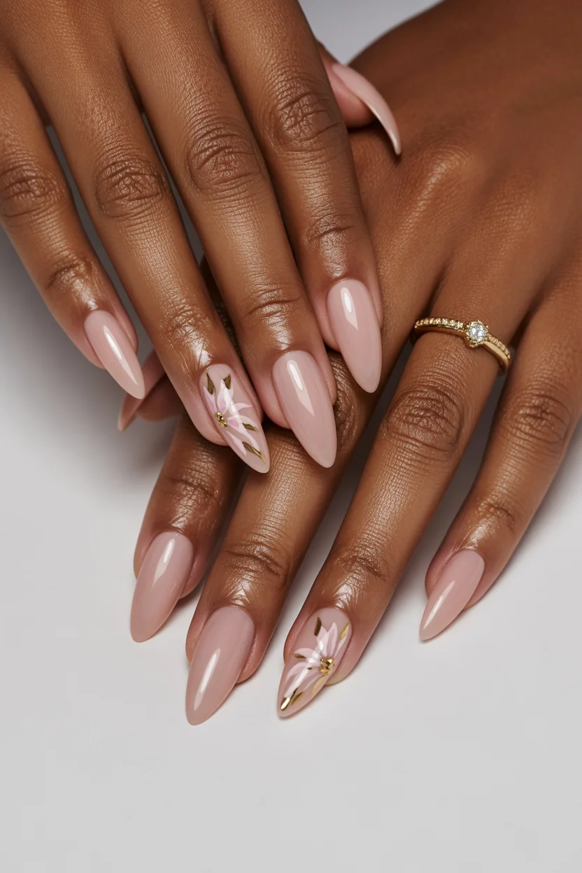 elegant pink spring nails 2026 nude almond with gold flowers