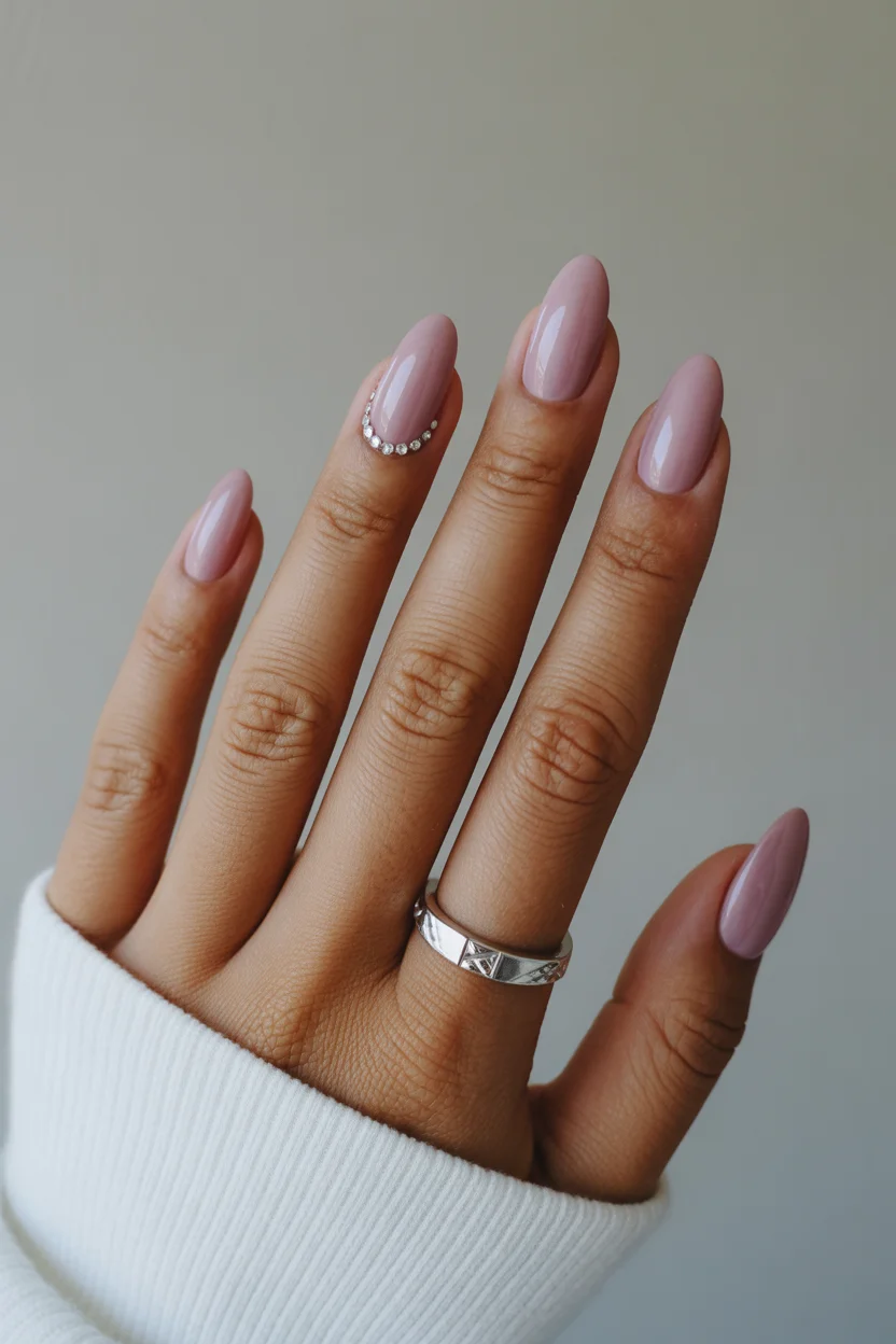 stylish spring nails for tan skin 2026 Glossy Blush Nude with Crystal Accent 10