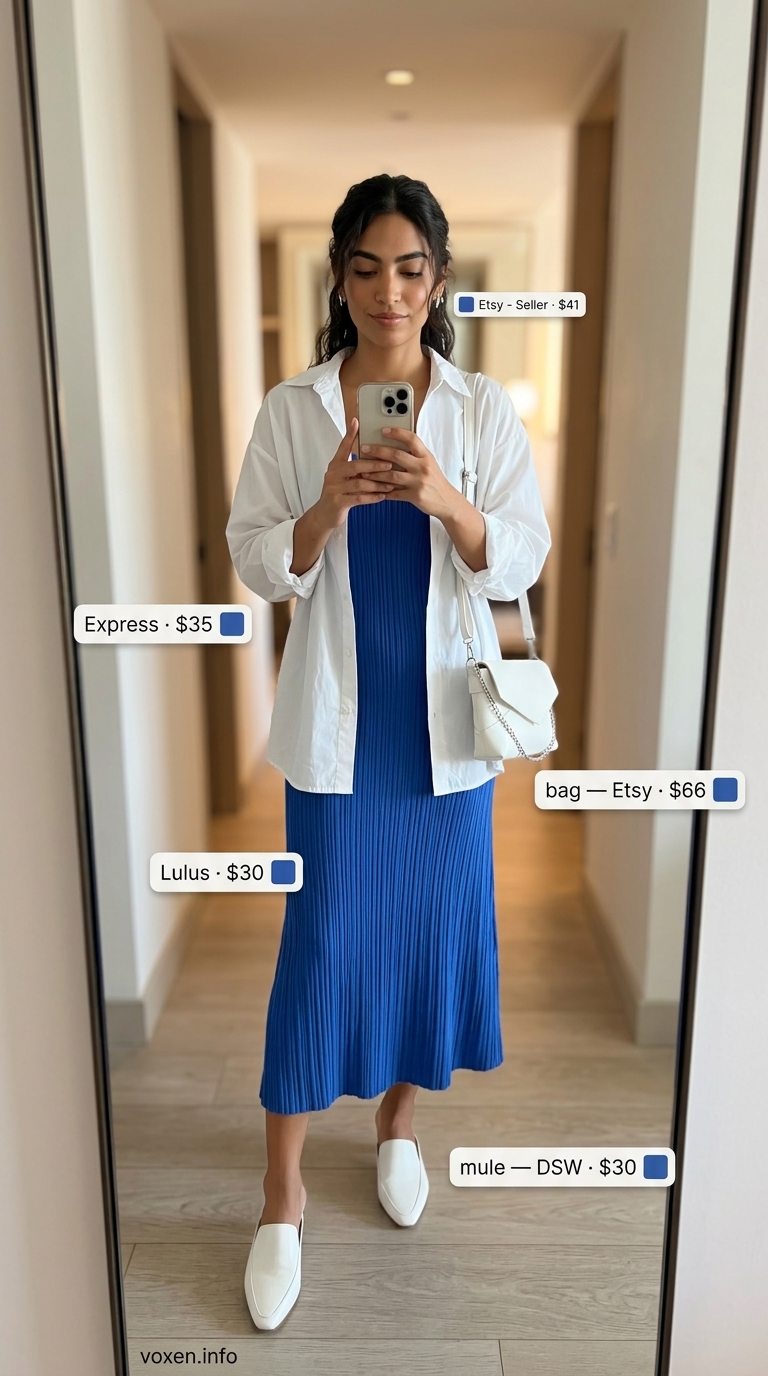 Concert outfits for women summer 2026: Cobalt blue midi dress, white button-down, and flat mules for a sleek evening look.