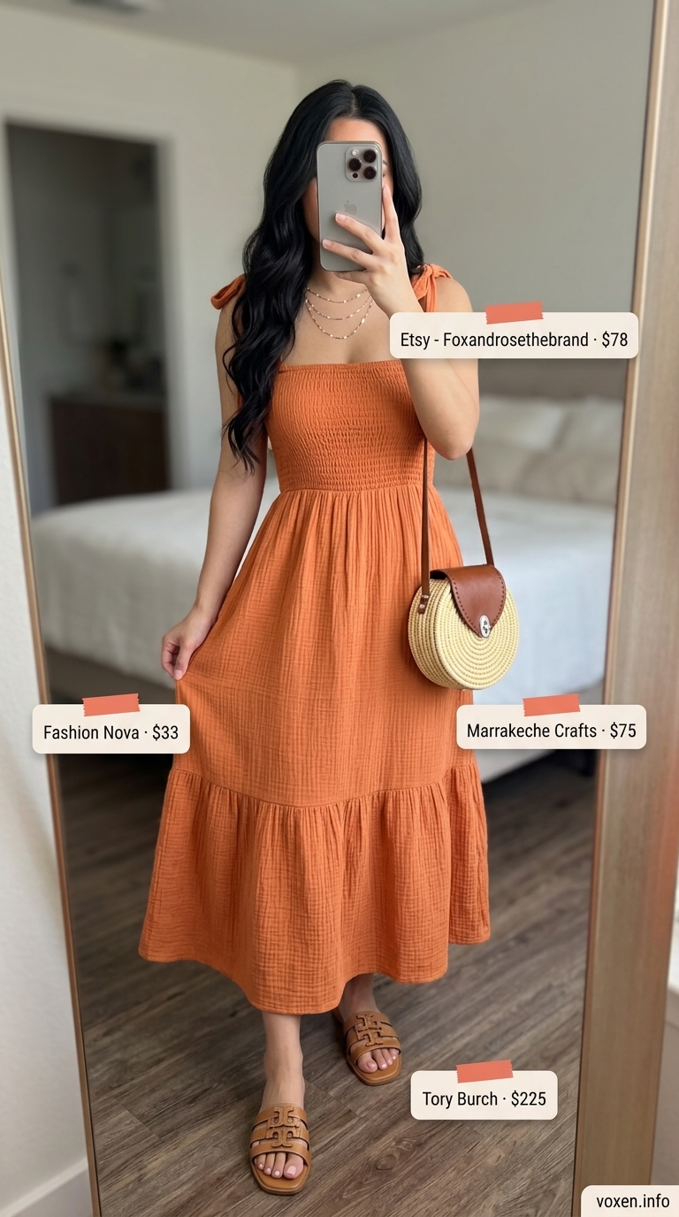 Terracotta midi dress for summer evenings, styled with flat sandals and gold necklaces.