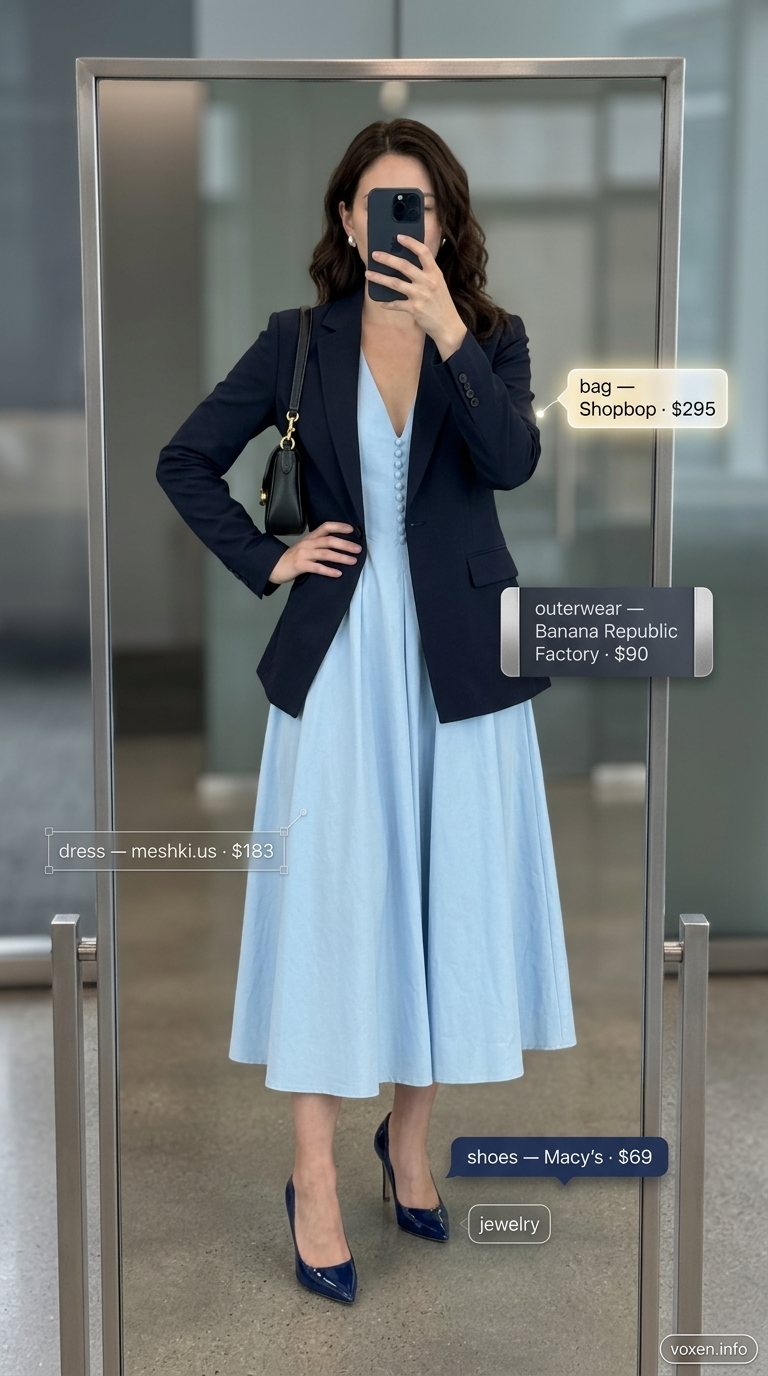 Summer work outfits for the office for women 2026: Sky blue A-line dress, navy blazer, and black pumps for a client meeting.