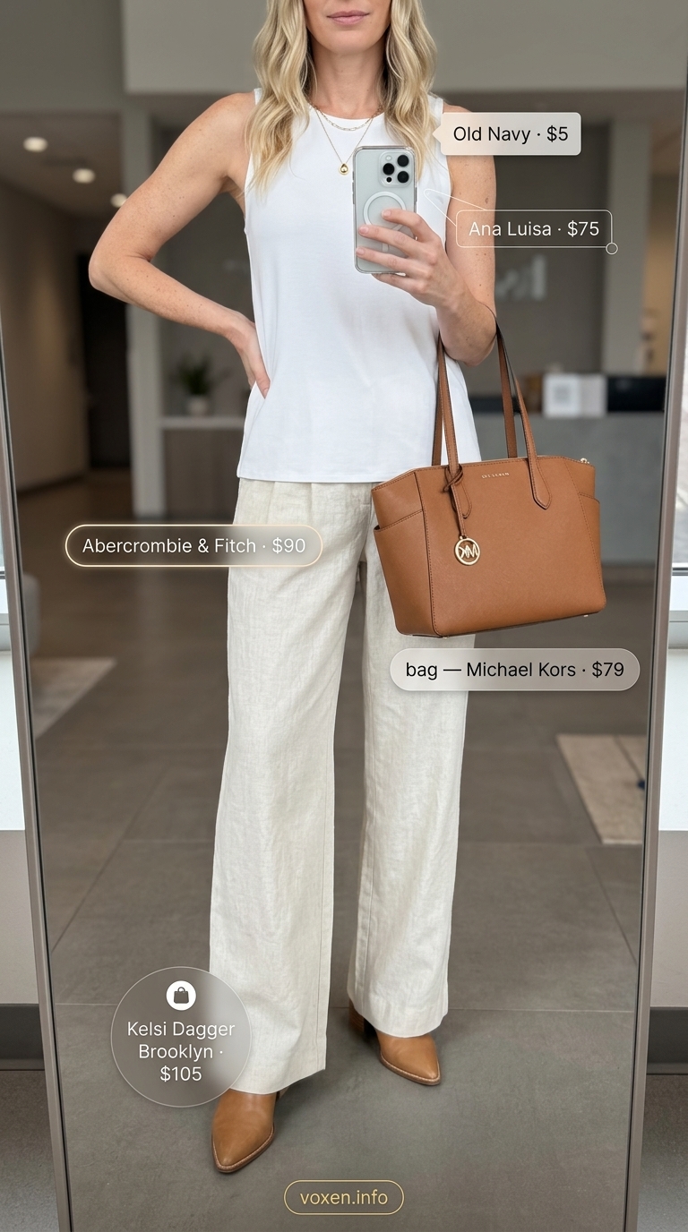 Light beige linen trousers for summer work outfits for the office for women 2026. Polished and comfortable with white shell top.