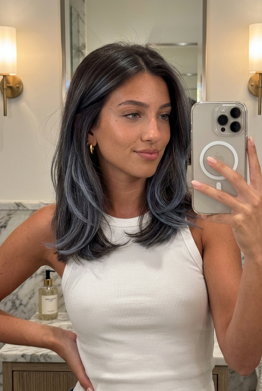 long layered hair with cool espresso balayage and ash-blue highlights, freehand balayage technique — sophisticated professional style