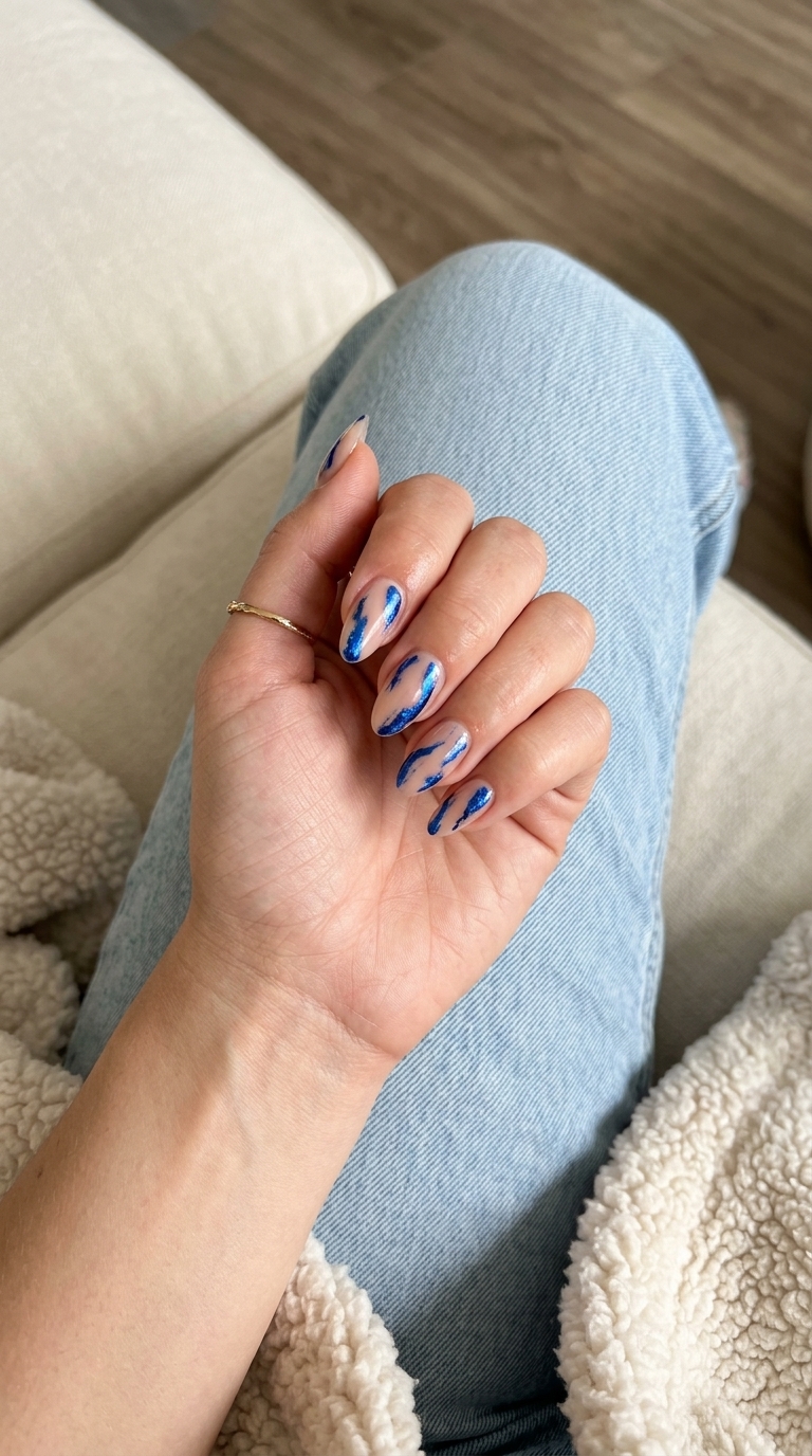 Cobalt Foil Almond Nails 2026 | Edgy Night Out Edgy Cobalt Blue Abstract Foil Almond nails for festivals and nights out. Fun summer nails 2026.