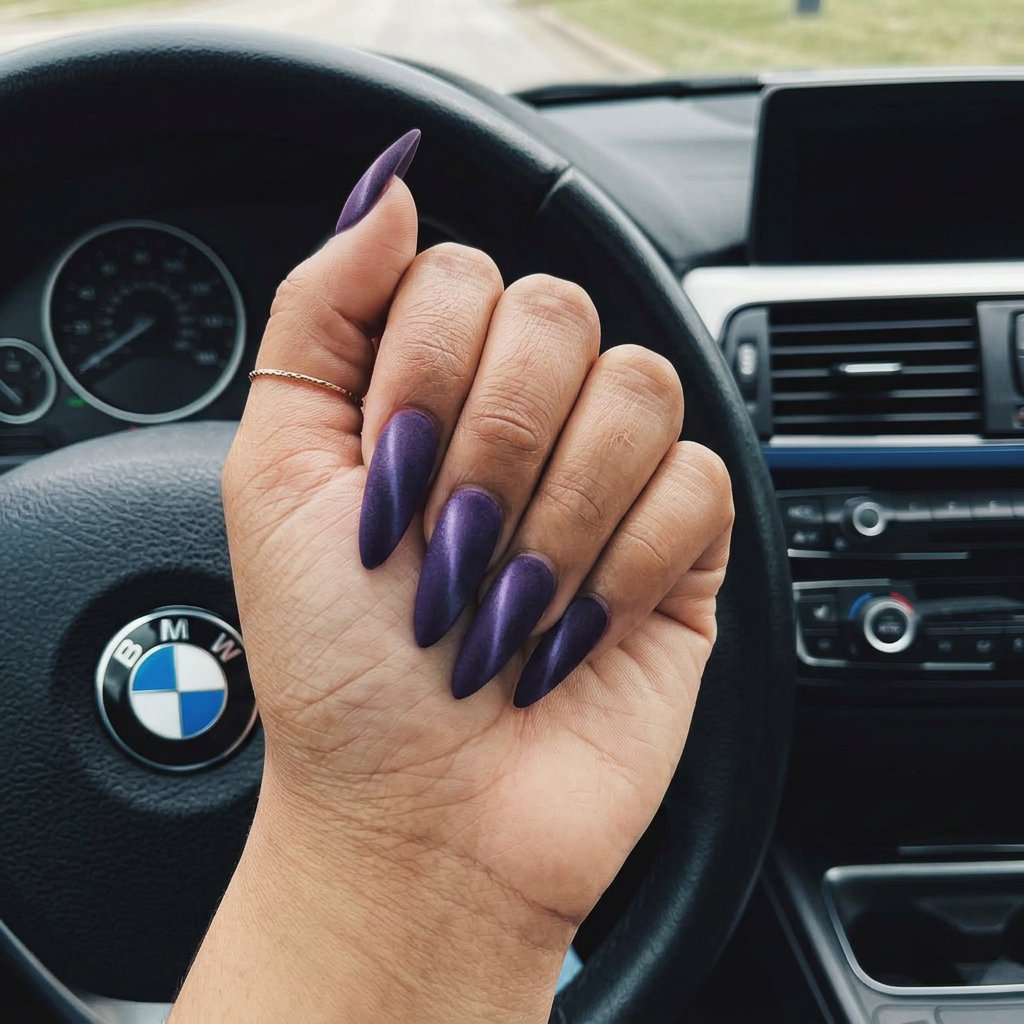 Velvet Cat-Eye Stilettos - June Ideas 2026 Mystic Velvet Cat-Eye Stiletto nails: deep purple with emerald shift for summer 2026.