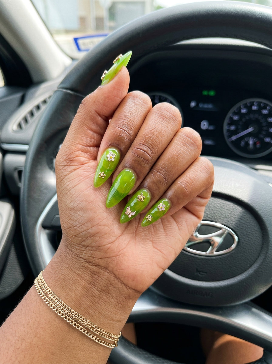 Long Summer Nails 2026: Edgy Lime Stilettos Long summer nails 2026: Vibrant lime green stiletto with 3D charms for festivals.