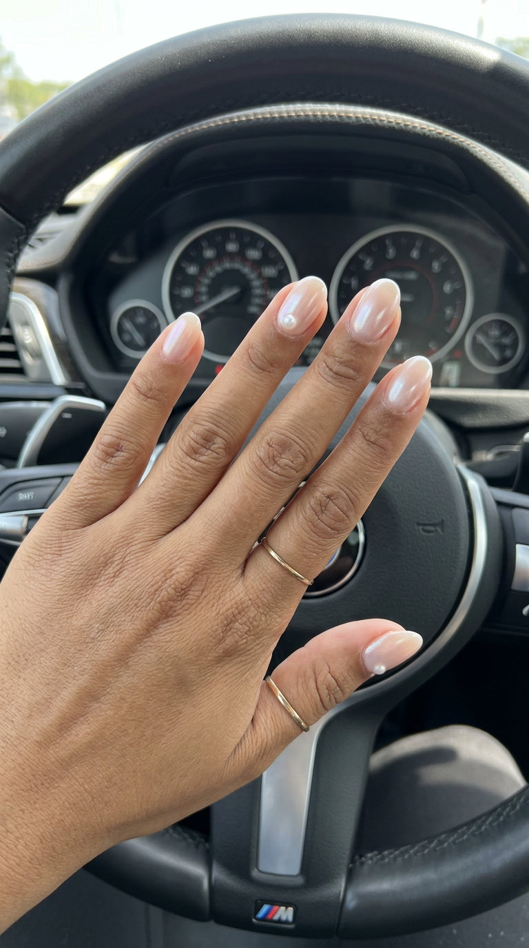 Sheer Nude Oval Summer Nails 2026 Sheer nude oval summer nails 2026 with pearl accent for all skin tones. Clean girl, minimalist style.