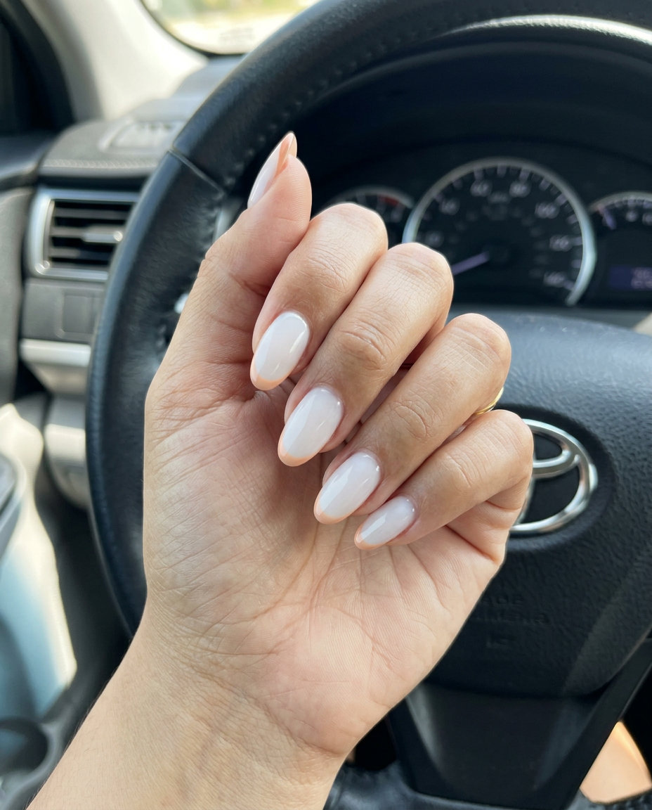 Soft Apricot Oval Summer Nails 2026 Soft apricot French oval summer nails 2026 for all skin tones. Refined wedding guest style.