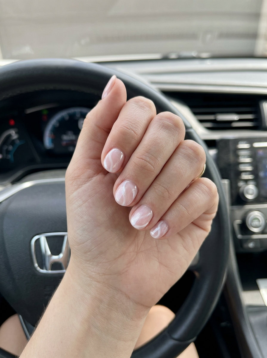 Short round summer nails 2026: Pink milk bath swirls. Romantic & ethereal for weddings.
