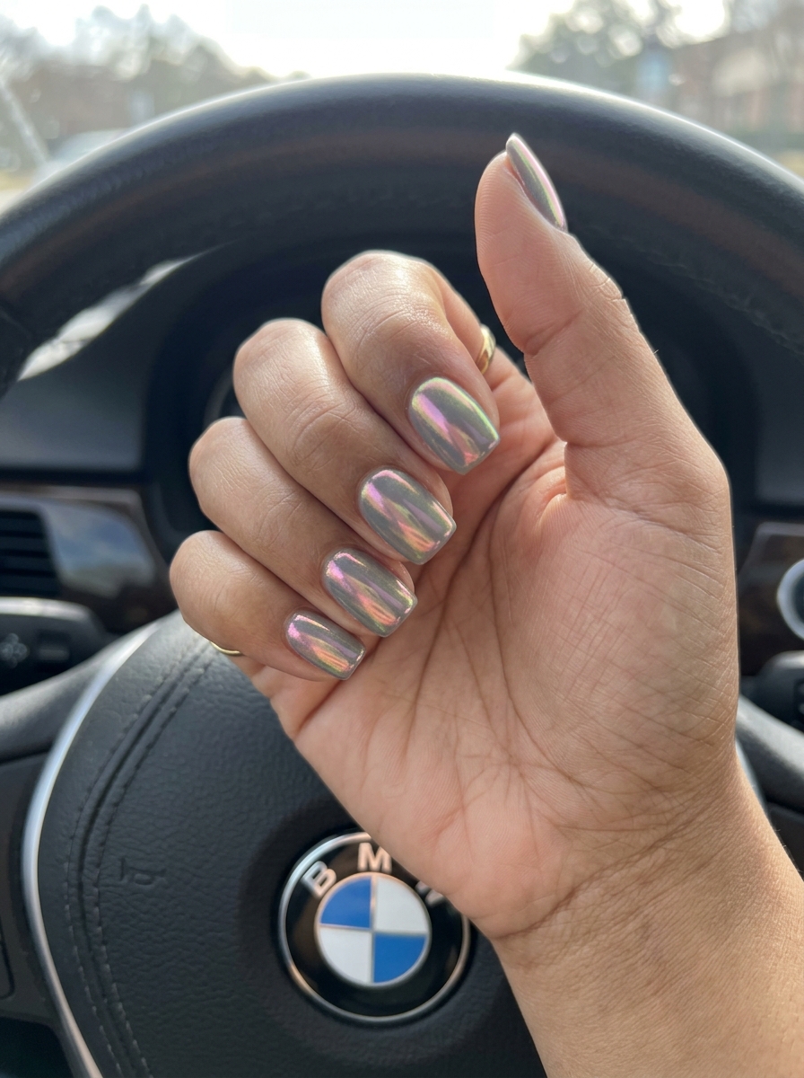 Ethereal shifting aurora chrome over soft grey square nails for polished spring chrome nails 2026.