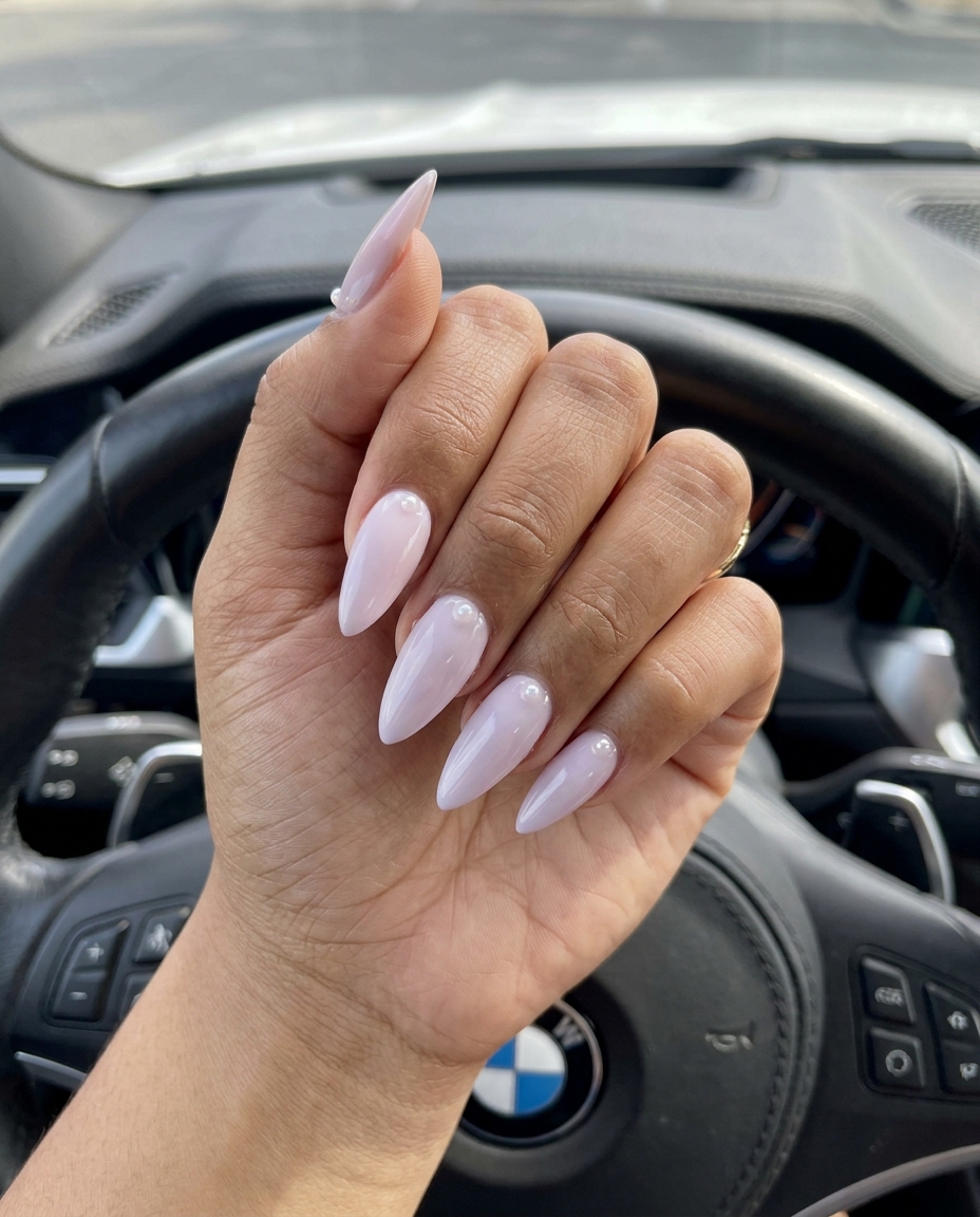 Stiletto Summer Nails 2026: Pearl Stiletto Stiletto summer nails 2026: Minimalist Pearl Stiletto for office and weddings. Chic, sophisticated look.