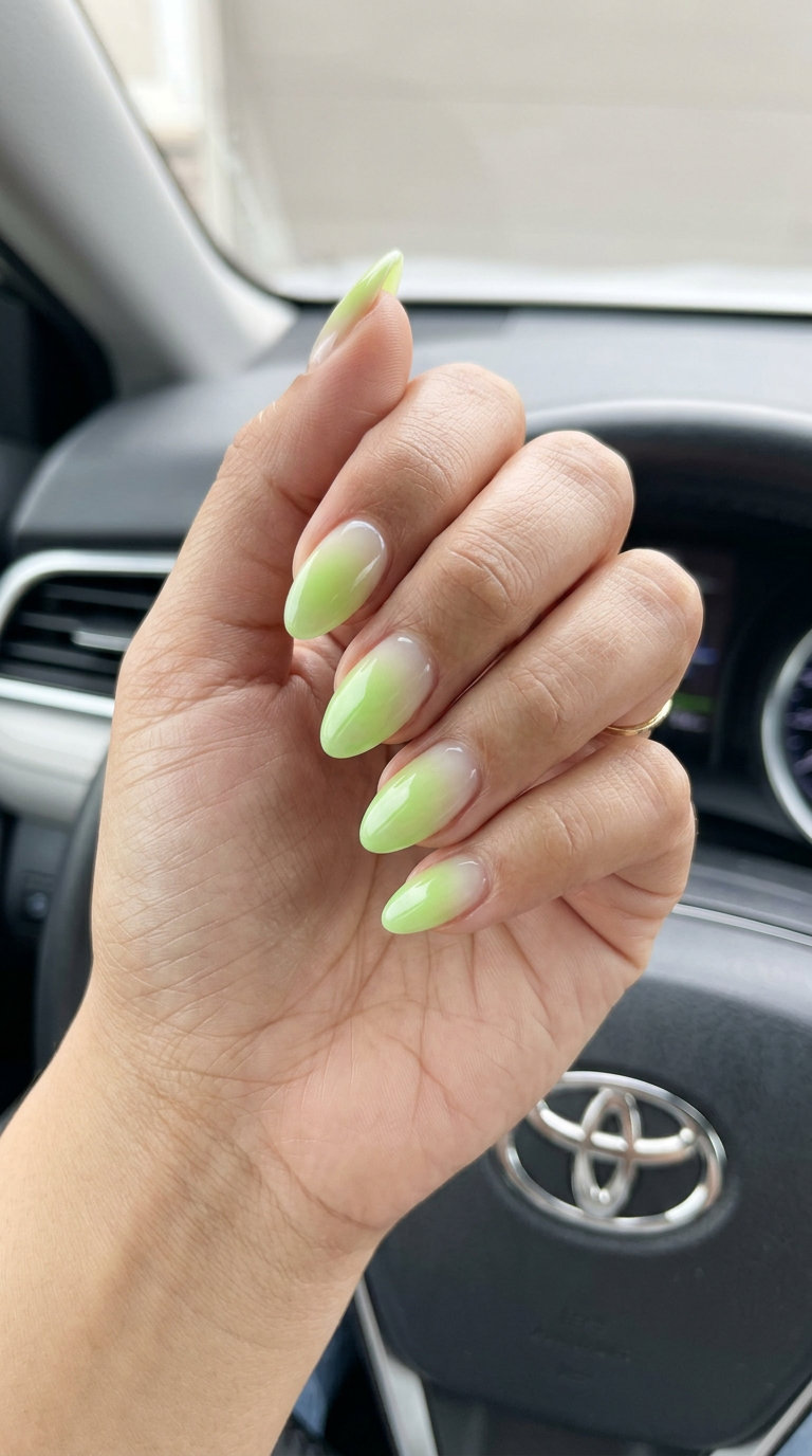 Lime green aura gradient nails on a milky base are whimsical summer colorful nails designs 2026.