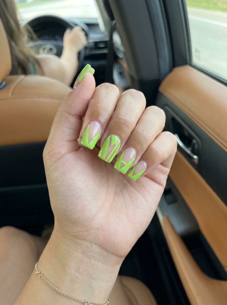 Summer colourful nails 2026: Geometric lime negative space design for parties and casual weekends.