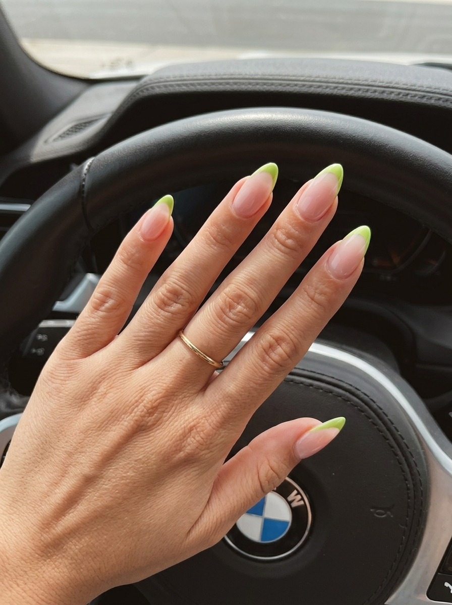 Summer colourful nails 2026: Zesty lime micro French tips for clean-girl style and daily wear.