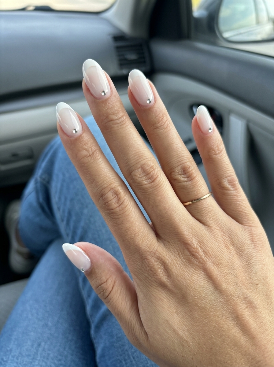 Milky White Rhinestone French nails for summer medium nails 2026. Elegant and classic bridal style.