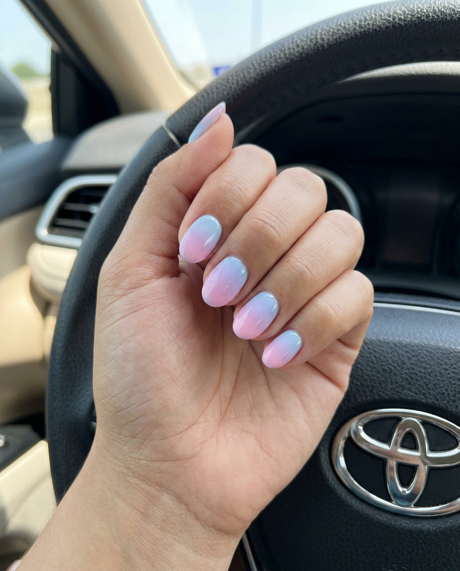 Pastel Gradient Ombre Nails 2026: Whimsical Summer Dreamy pastel gradient ombre nails in baby blue, lavender, and pink for casual summer outings 2026.
