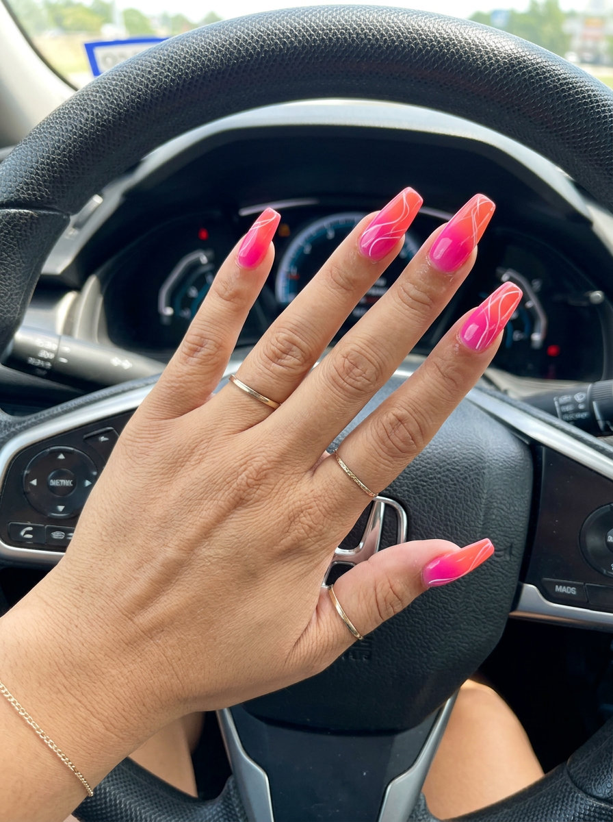 Sunset Ombre Swirl Nails 2026: Festival Fun Sunset Ombre Abstract Swirls Nails 2026: Vibrant hot pink and coral with white swirls for summer vibes.