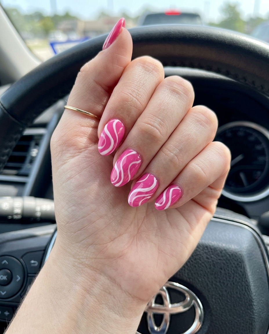 Party Nails 2026: Fuchsia Pop Swirl Party nails 2026: Fuchsia Pop Swirl with vibrant hot pink and white abstract swirls.