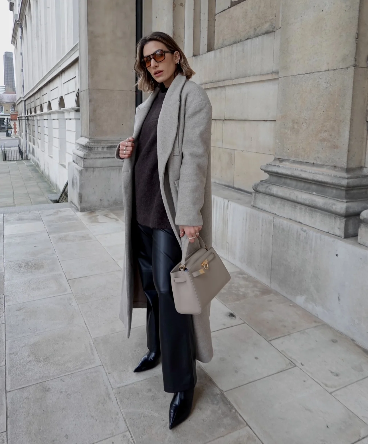 fall outfits with coat 2026 Soft Greige Coat With Modern Leather Trousers