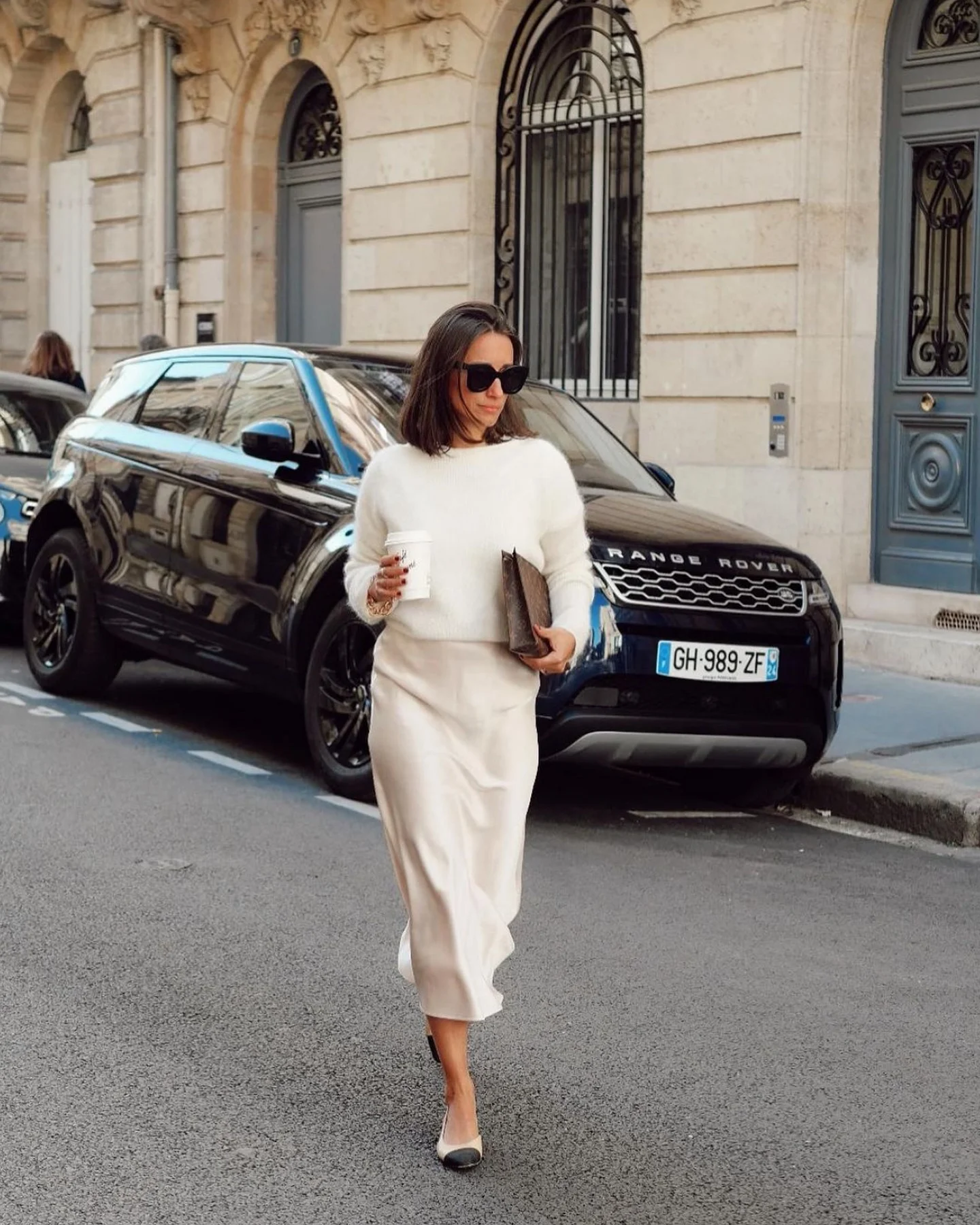 modest fall outfits 2026 Minimalist Ivory Knit And Satin Skirt Combination