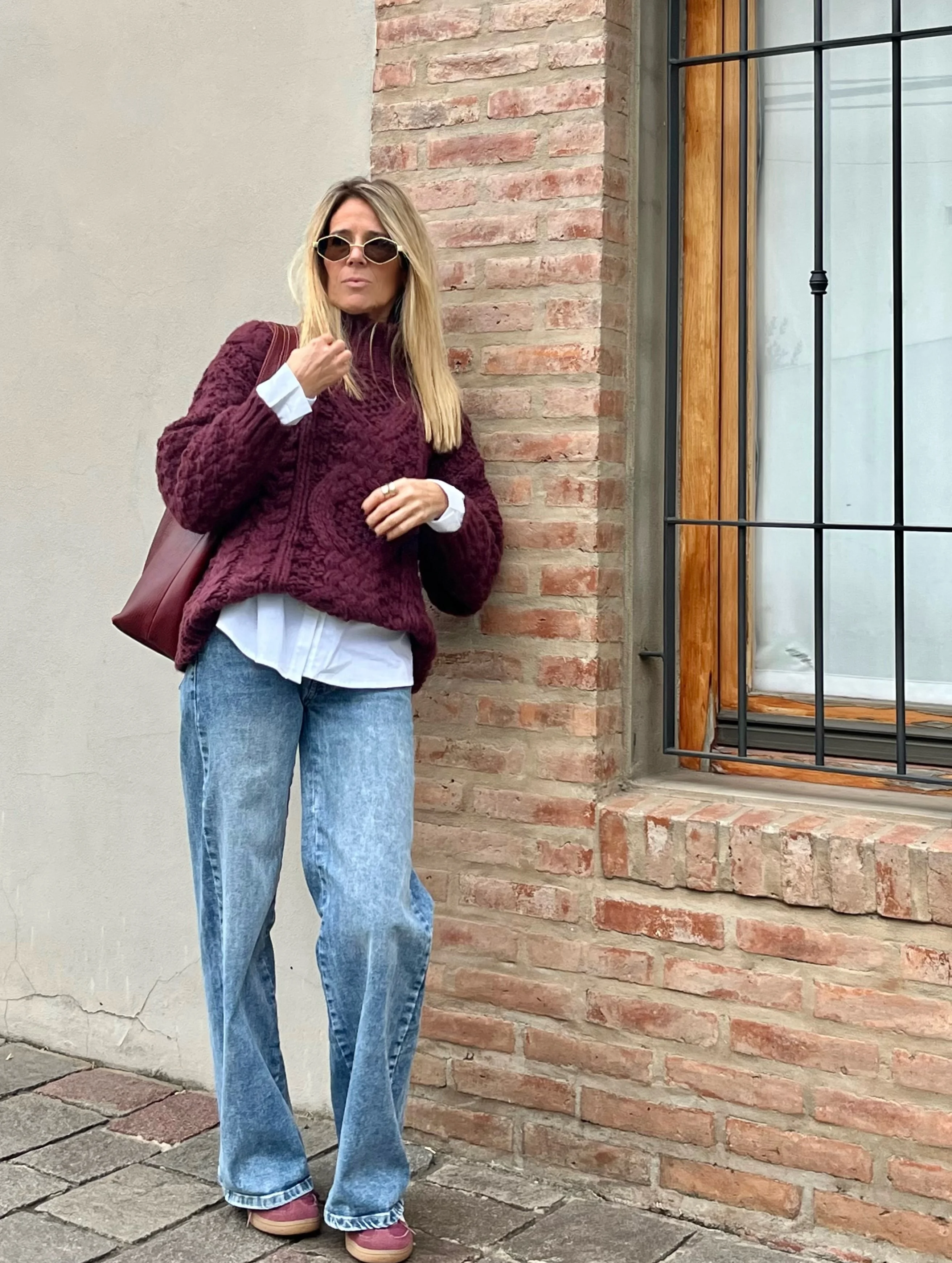 fall travel outfits 2026 Cozy Knit Layers With Relaxed Denim