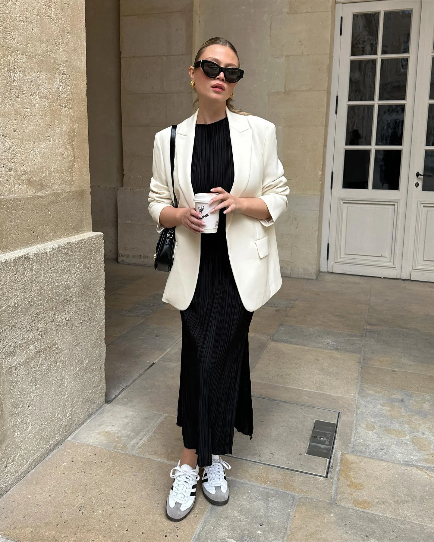 modest fall outfits 2026 Modern Black Dress Styled With A White Blazer