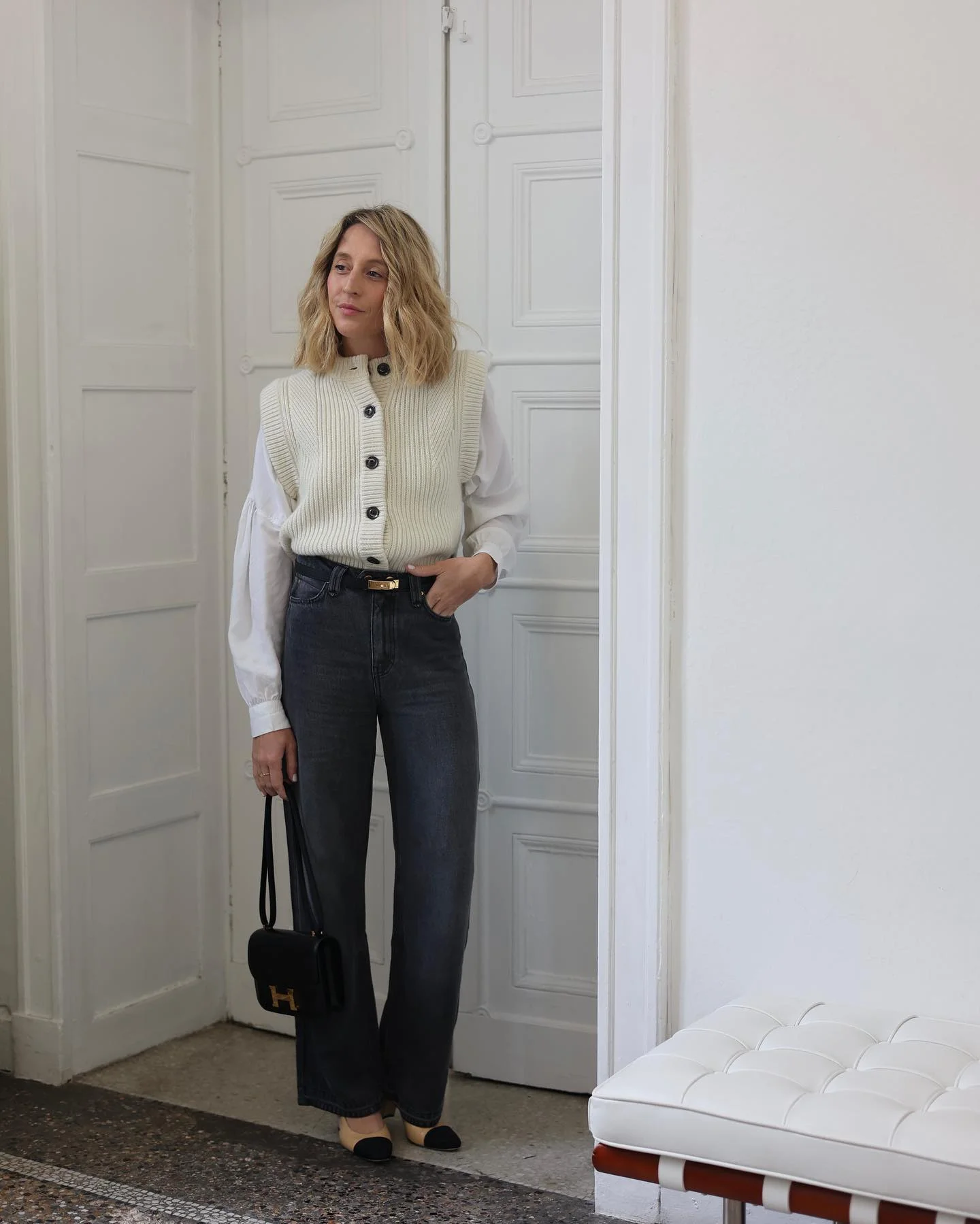 modest fall outfits 2026 Chunky Knit Vest With Dark Straight-Leg Denim