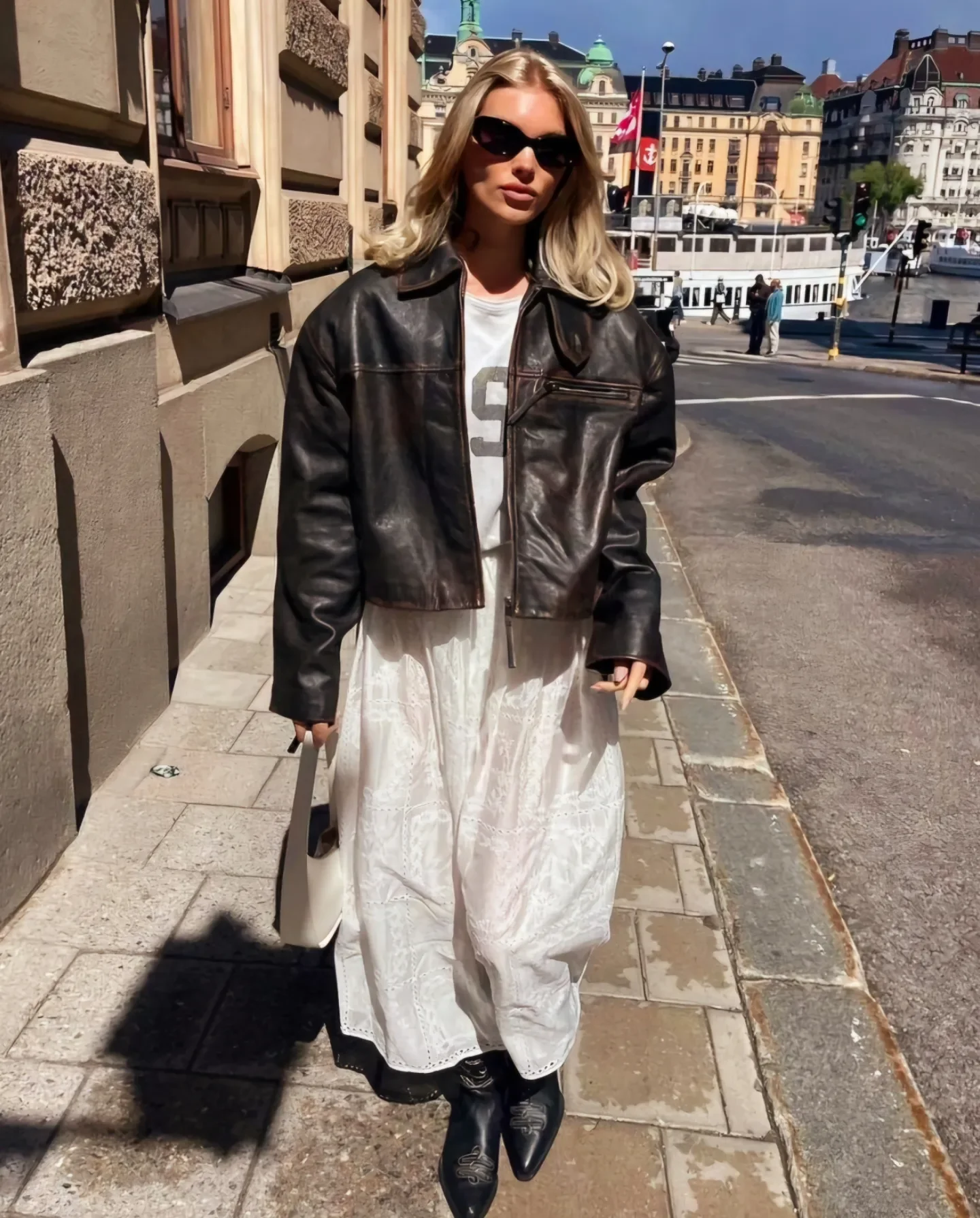 boho chic fall outfits 2026 Modern Boho Layers With A Leather Jacket And Romantic White Dress