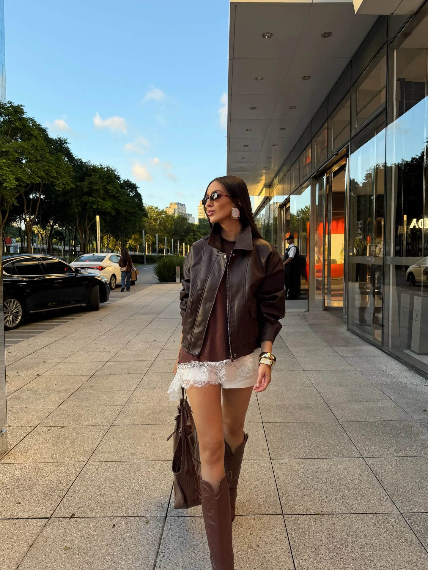 fall going out outfits 2026 Leather Jacket And Lace Shorts For Evening Confidence