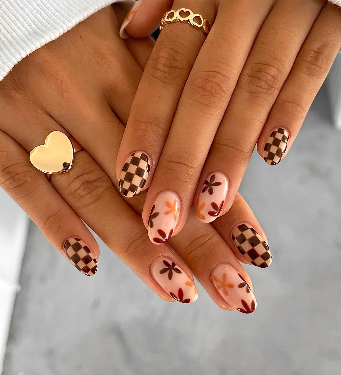 fall manicure 2026 Chocolate Checkerboard Meets Delicate Autumn Florals