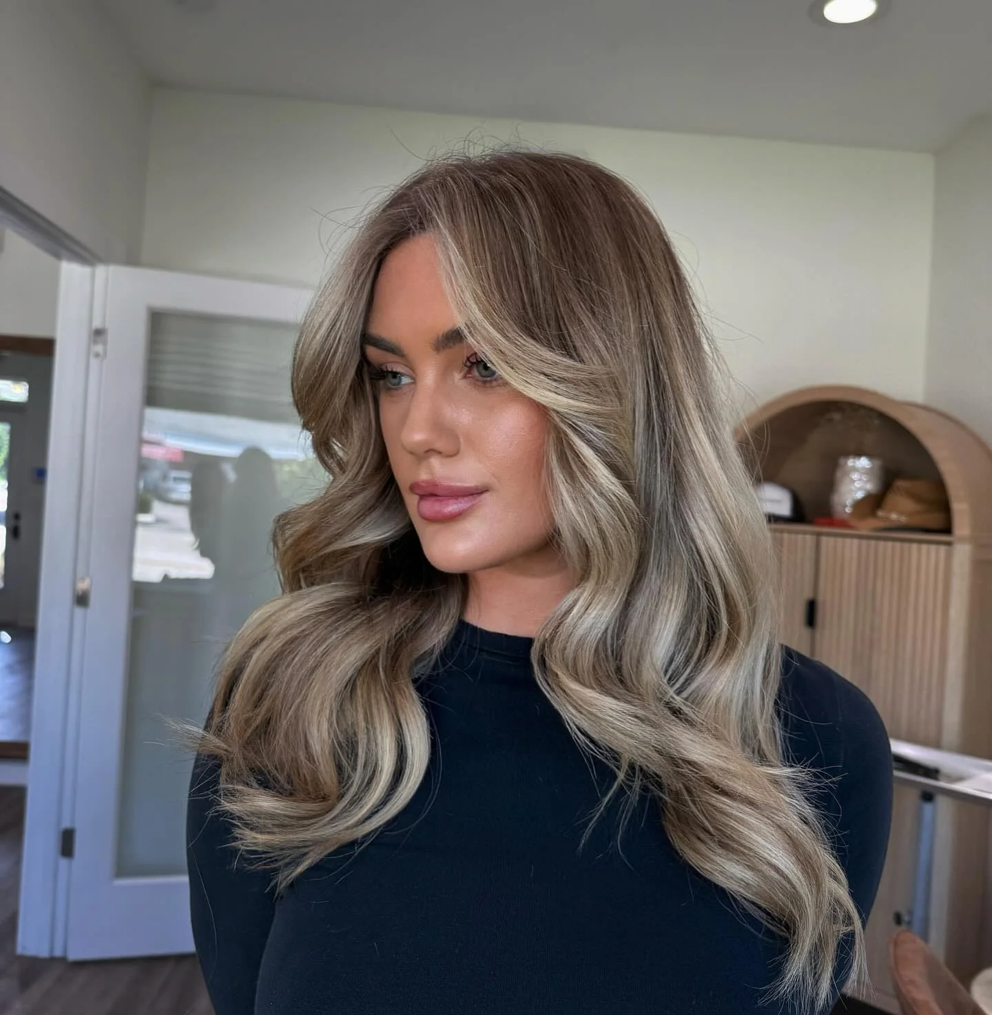 hair lowlights: color ideas and inspiration Soft Mushroom Blonde With Face-Framing Dimension