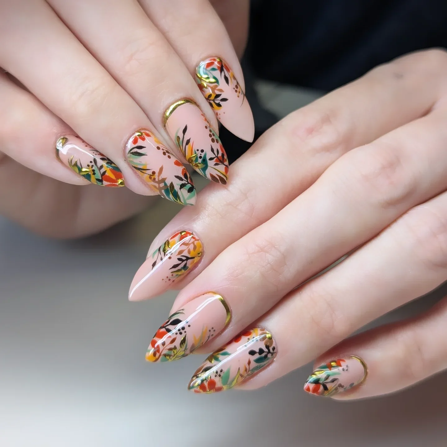 september nail art ideas 2026 Autumn Botanical Almond Nails With Gold Details