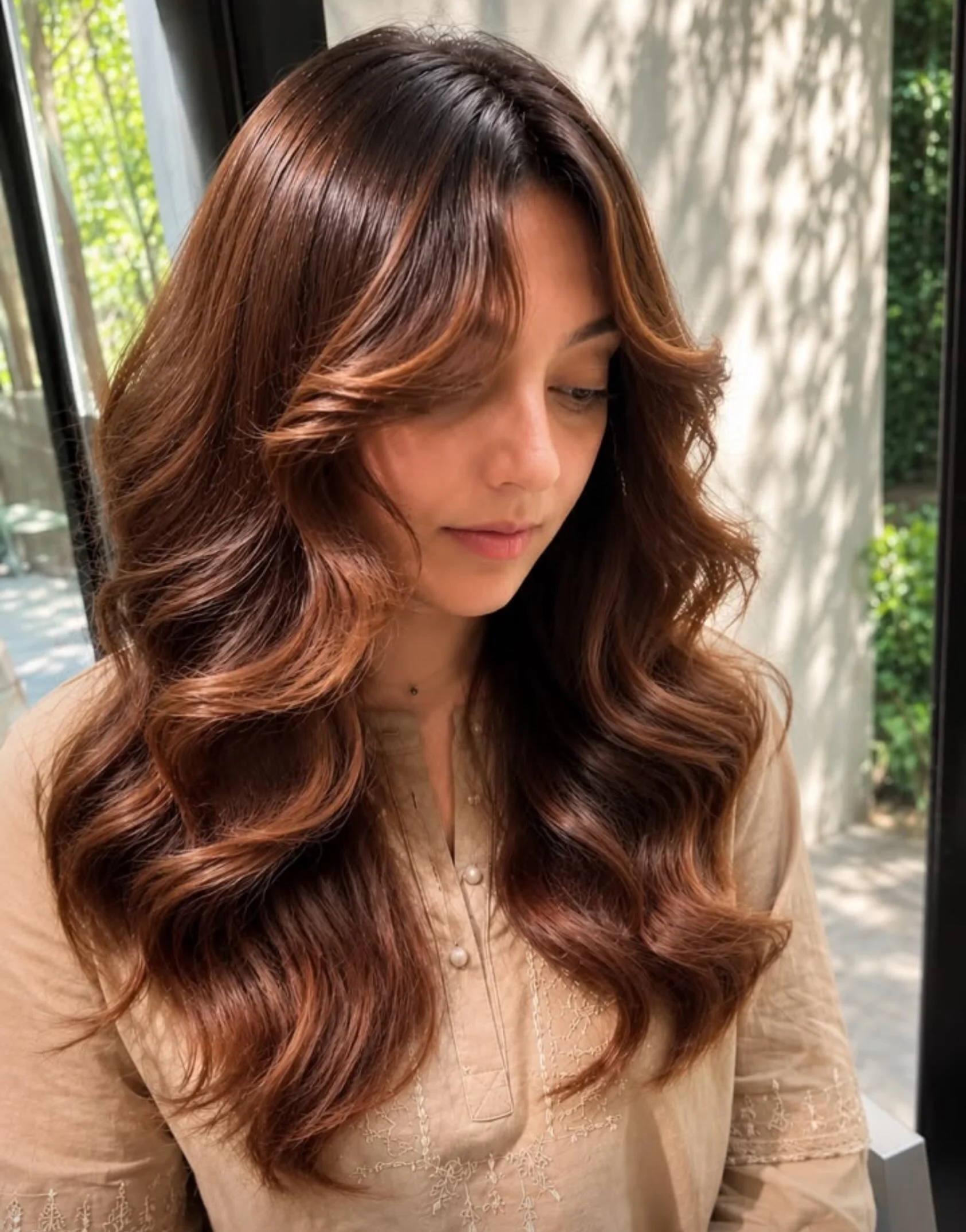 chestnut brown hair color Dimensional Chestnut Waves With Delicate Balayage Glow