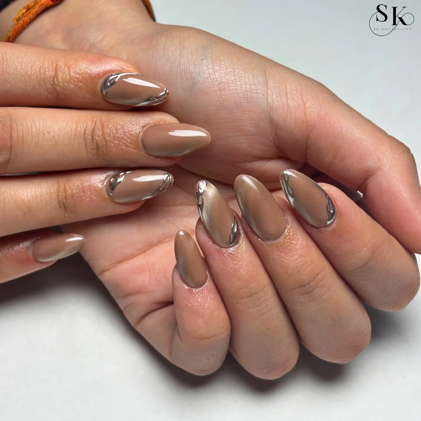 fall almond nails 2026 Minimal Taupe Chrome Outline Almond Nails