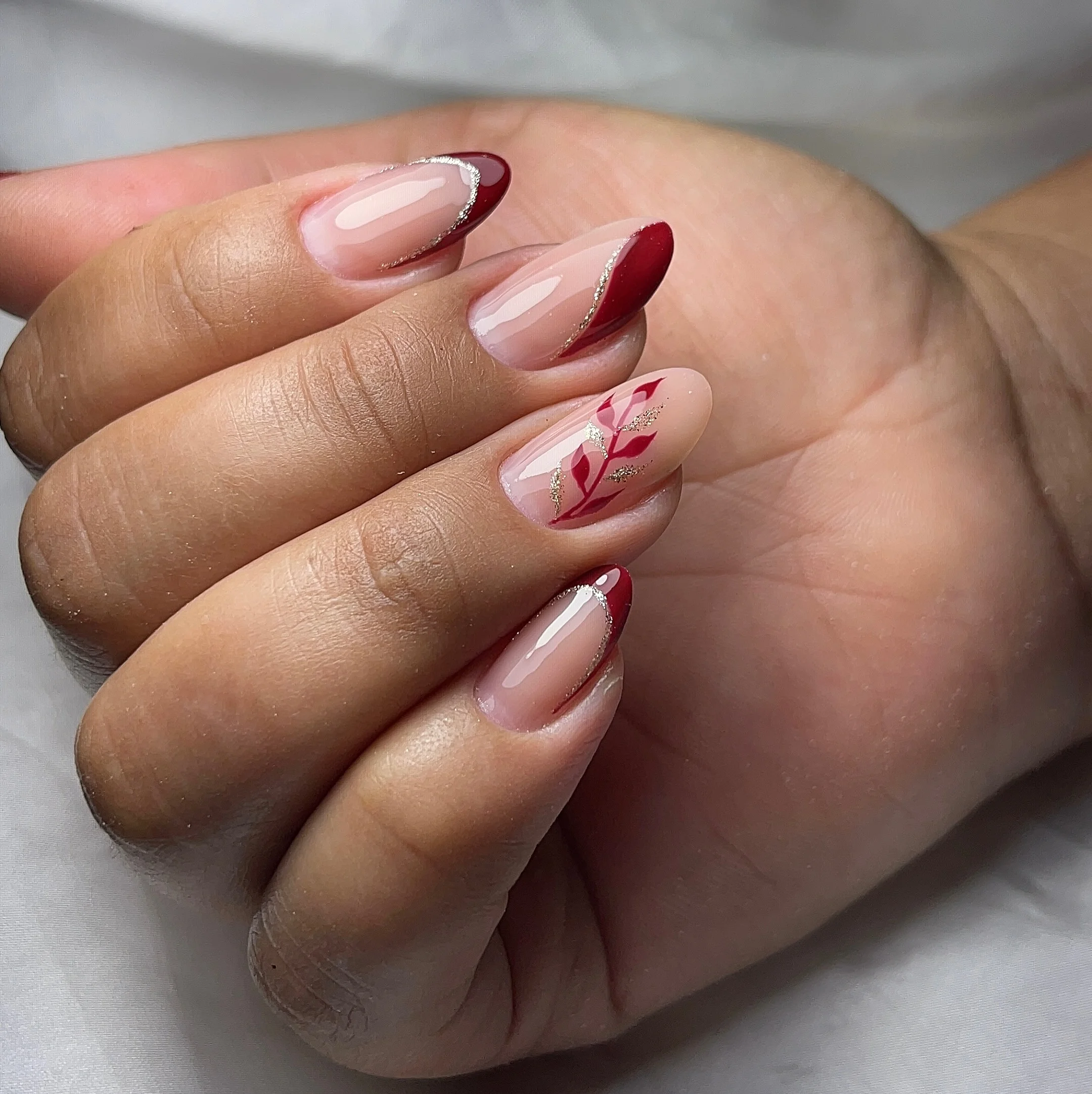 fall red nails 2026 Modern Burgundy French Tips With Golden Details